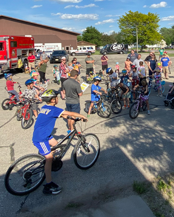 A group of kids on bikes at the West Salem Police Department Bike Rodeo.